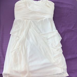 A gorgeous short white ruffled dress